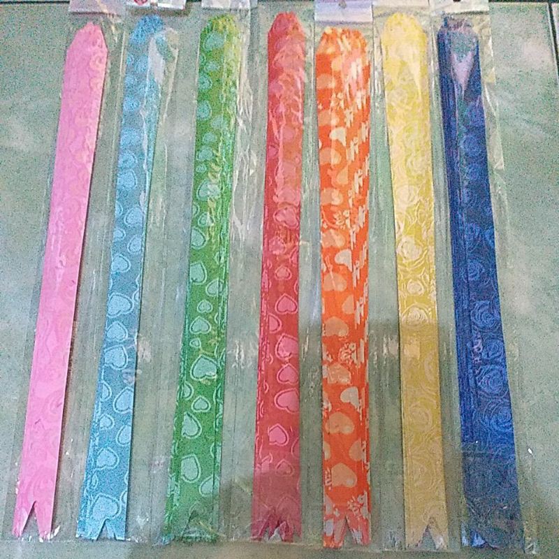 

Pita Kado Tarik Motif 18 mm x 340 mm