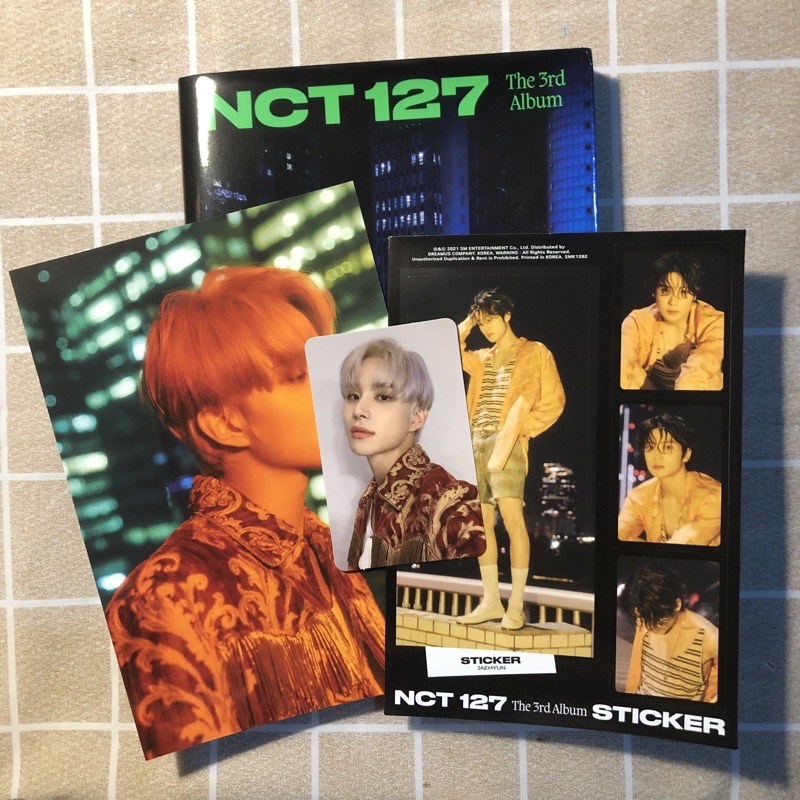 [NCT 127] Sticker Album Seoul City Ver. (Jungwoo Photocard, Jungwoo Postcard, Jaehyun Sticker)