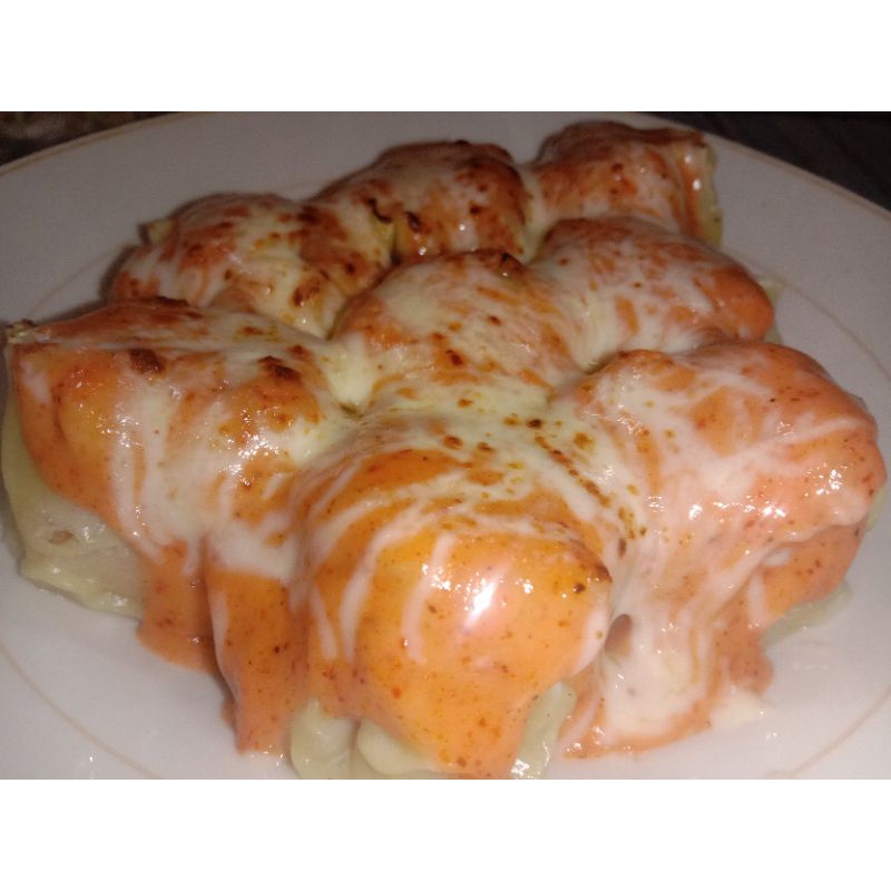 

Dimsum ayam saus mentai topping Mozarella