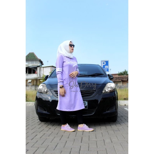 Six Diary Long Tunik Wanita Kaos Combed Saku Doraemon List Belah Samping