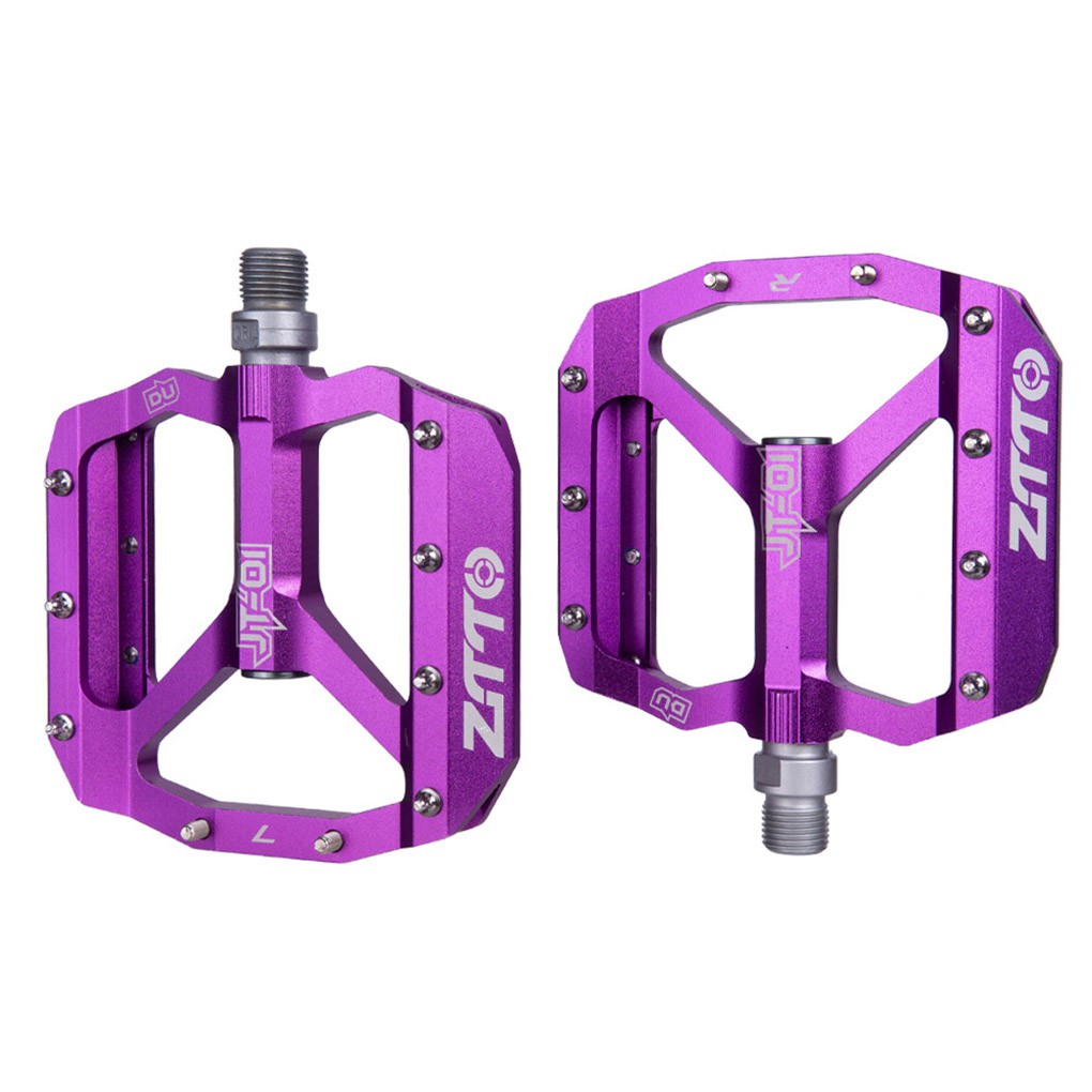 purple bike pedals
