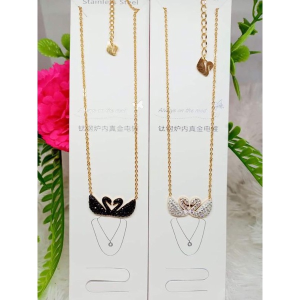 kalung titanium bebek kembar