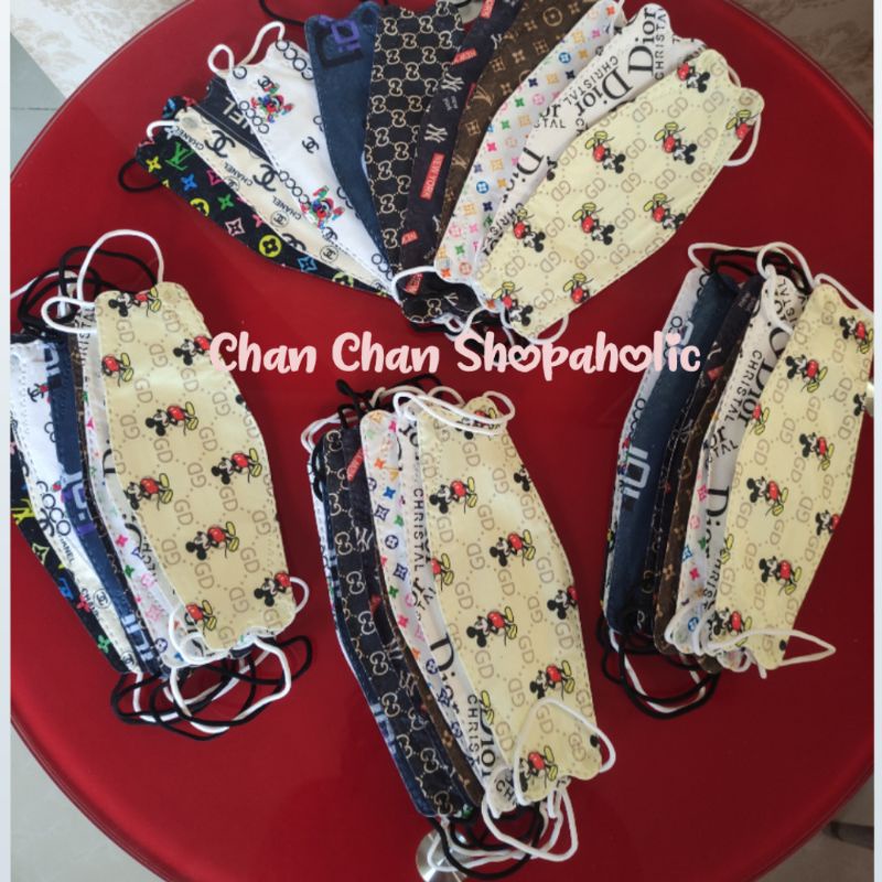 Masker dewasa KF 94 motif ,, 1 pack isi 20pcs