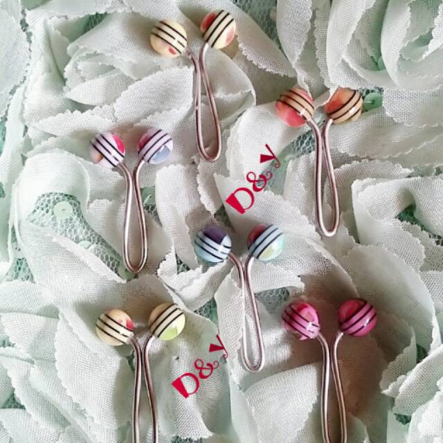 Klip jilbab manik jelly