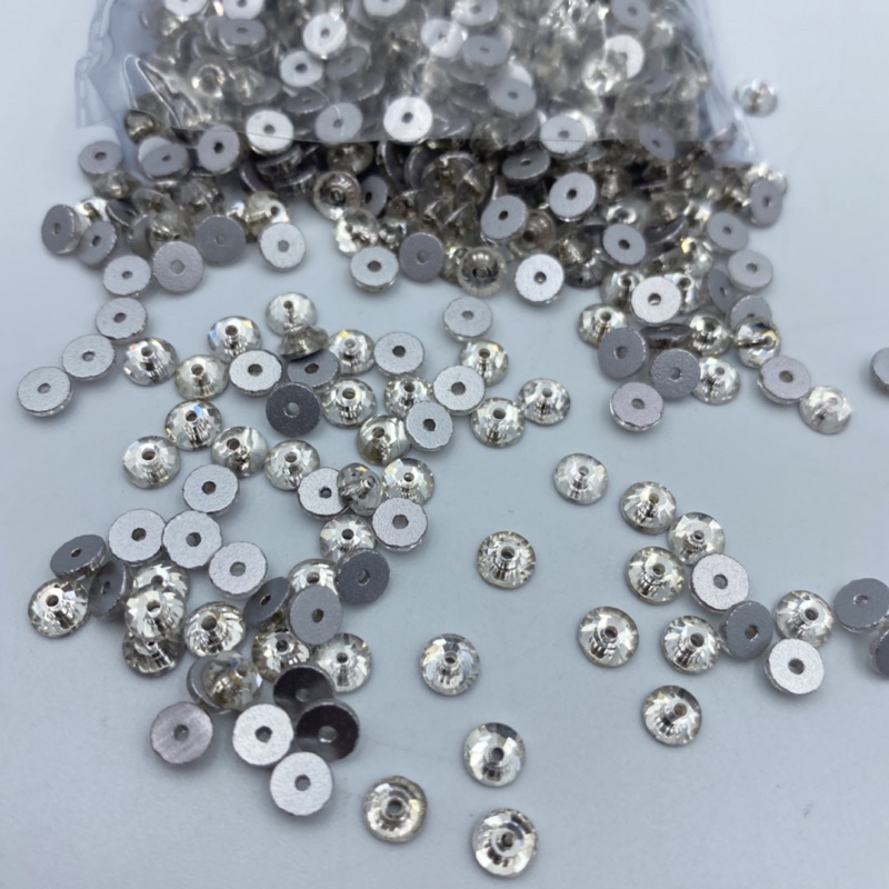 STONE KACA KRISTAL MOTIF BULAT LANCIP BOLONG TENGAH UKURAN 5 MM WARNA PUTIH BERSIH KUALITAS GRADE AA KILAU BAGUS CANTIK PER LUSIN