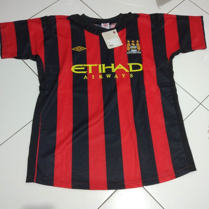 jersey bola retro Manchester City away 2011/2012 grade AAA made in Thailand