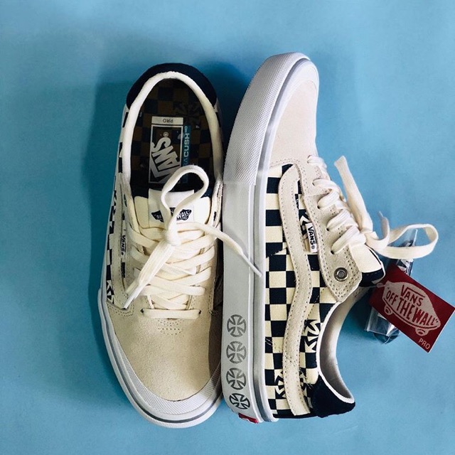white checkerboard skate shoes 