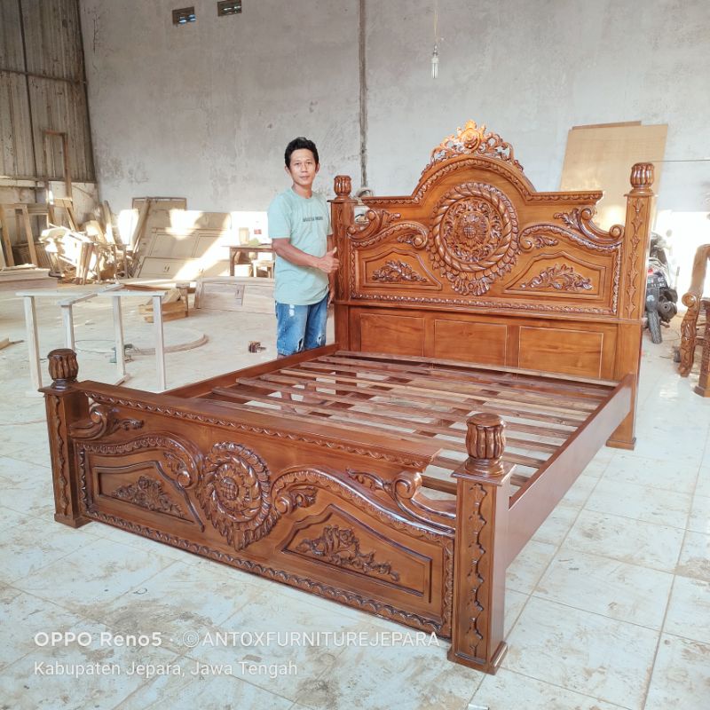 tempat tidur jati ukiran gong mebel jepara