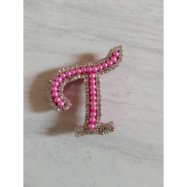 Bros Huruf F, M dan T