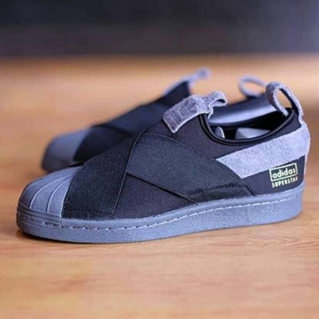 grey slip on adidas