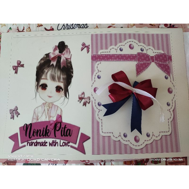 

PENAMBAHAN TALI BELAKANG IKAT PITA HAMPERS