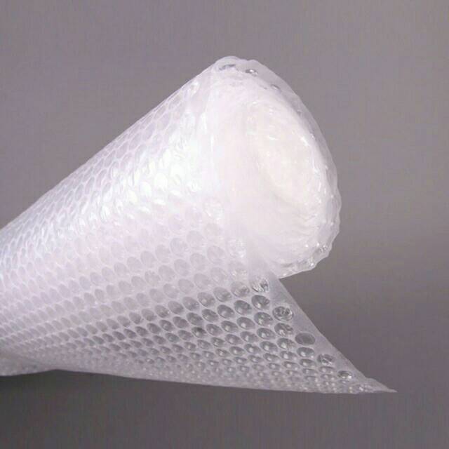 Tambahan bubble wrap untuk keamanan paket