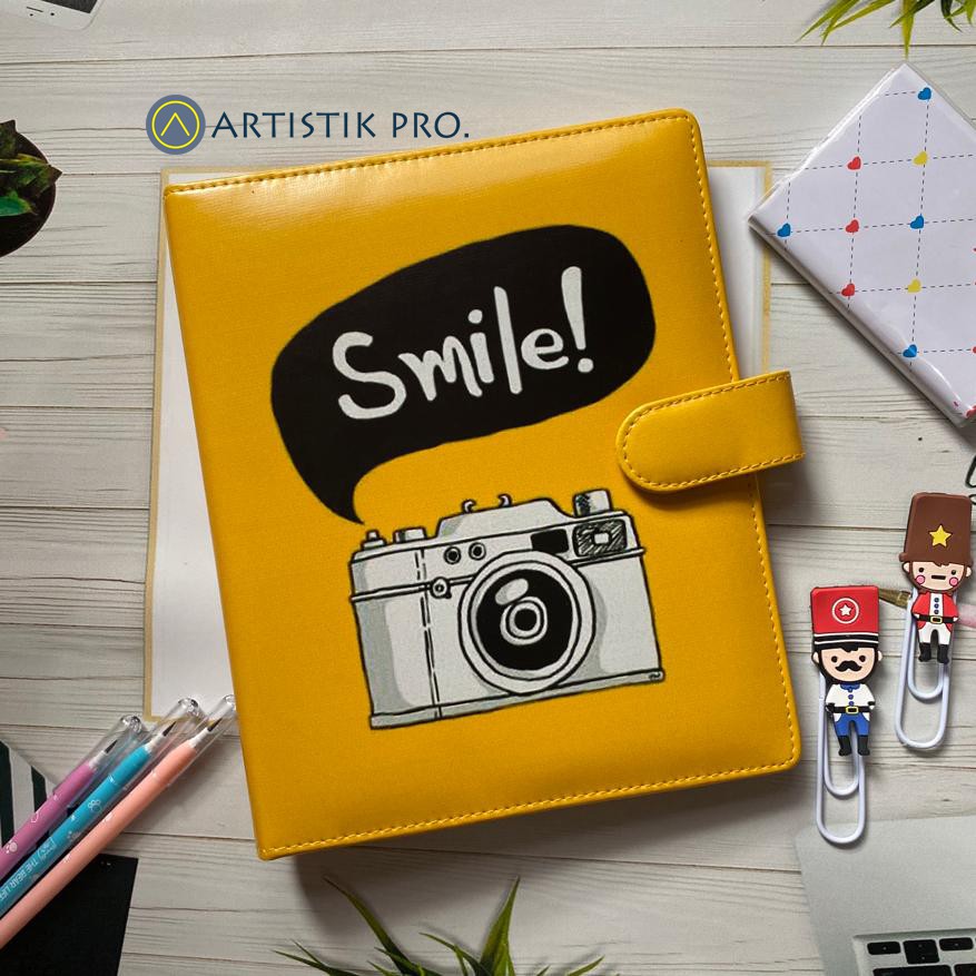 

BINDER PRINTING MOTIP CAMERA SMILE A5 DAN B5