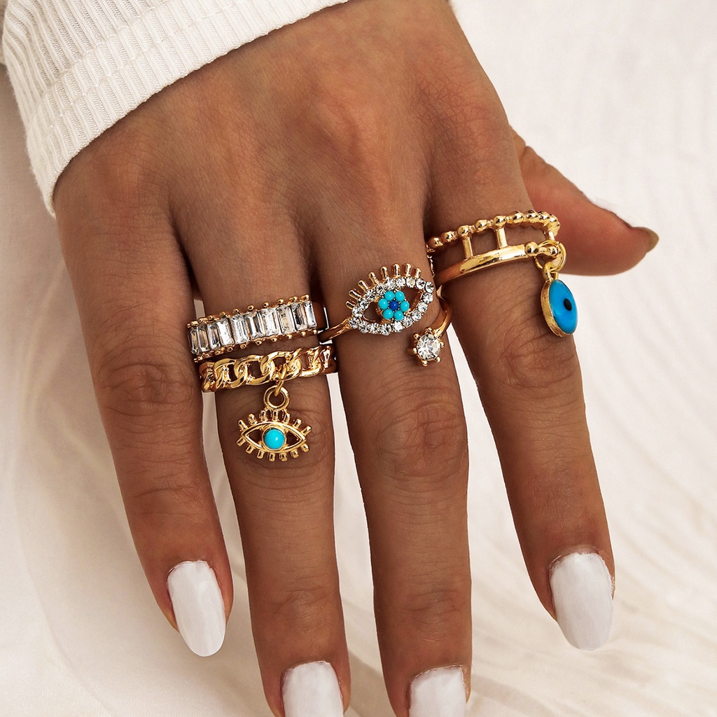 4pcs / Set Cincin Knuckle Desain Mata Iblis Aksen Kristal Warna Emas Gaya Vintage Boho Untuk Wanita