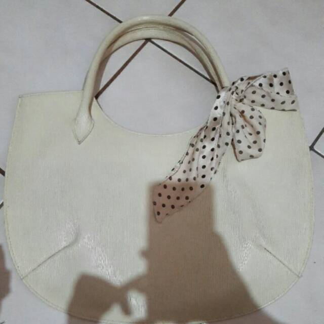 

Tas warna broken white