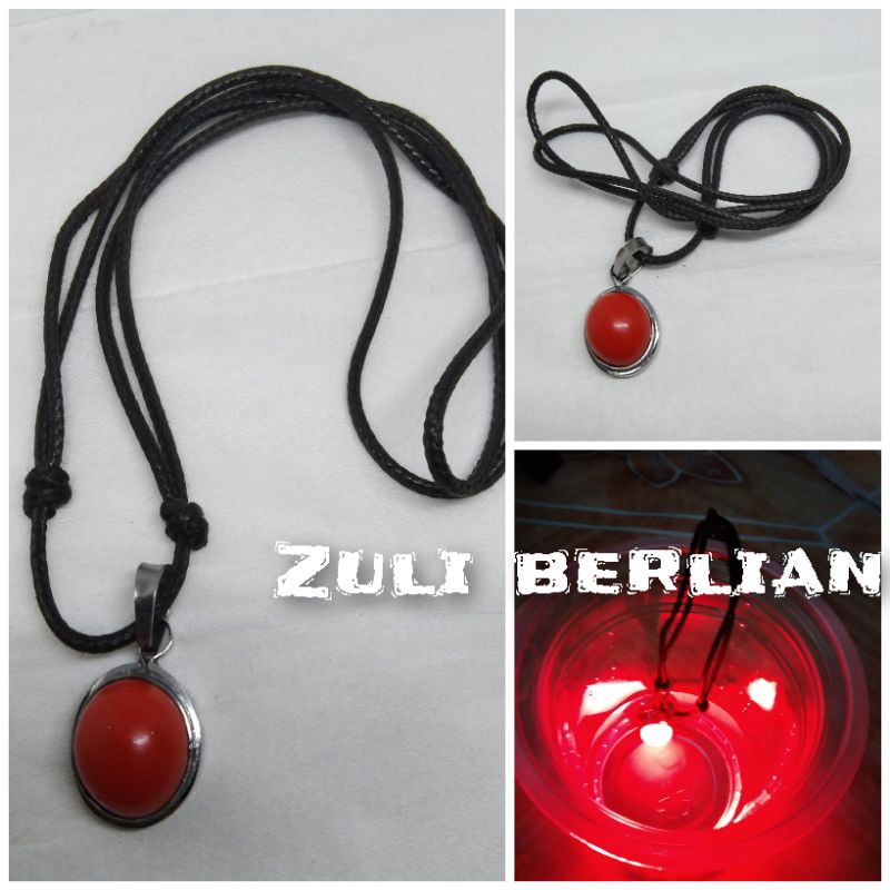 Kalung liontin batu pospor merah nyala jika kena air