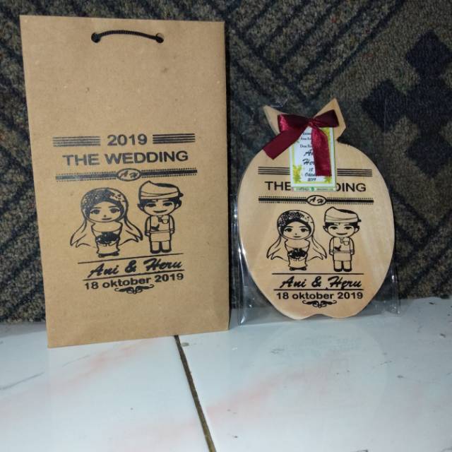 

Souvenir telenan kmas plastik plus paperbag