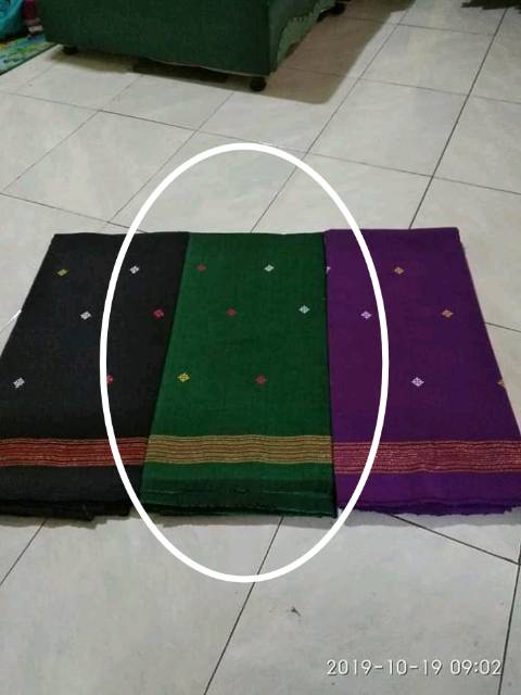 Baju adat paruki bintik tenun khas toraja