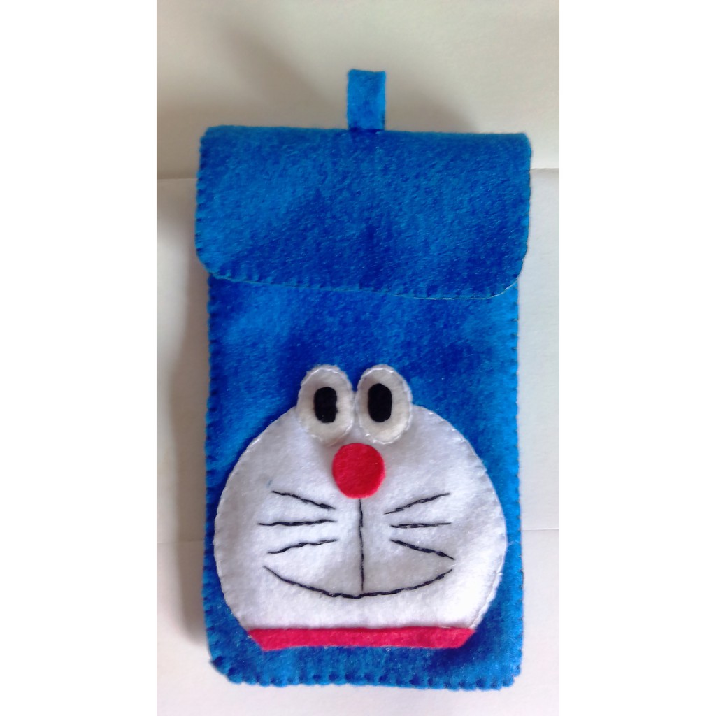 Softcase sarung Handphone motif  doraemon  dari kain  Flanel  