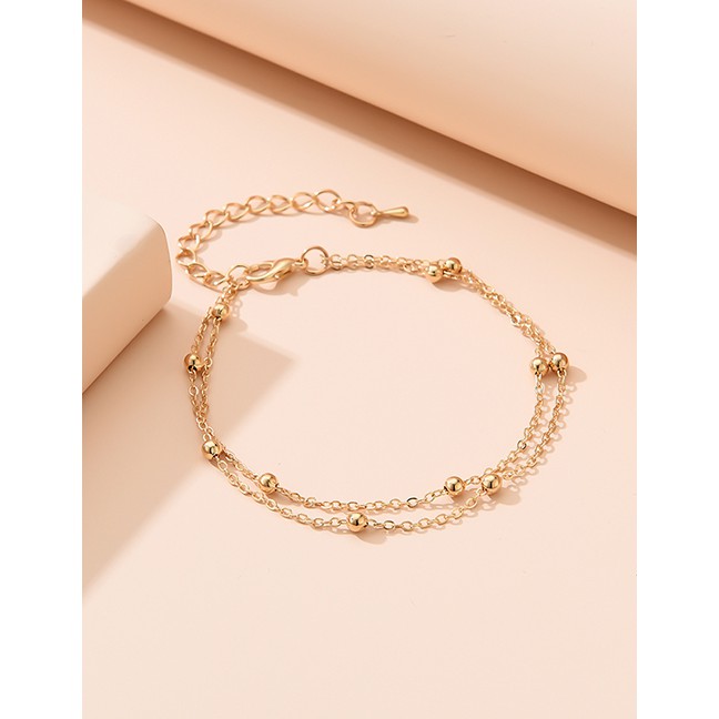 LRC Gelang Fashion Gold Color En Round Bead Beaded Alloy Multilayer Bracelet K91775