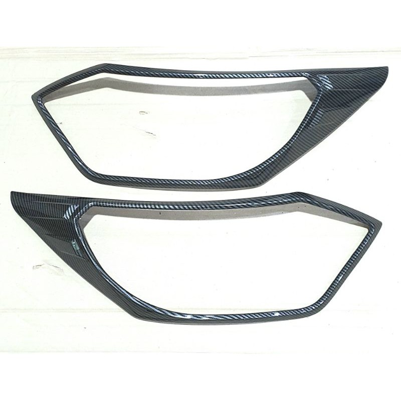 Garnish lampu carbon lampu depan Calya Sigra lama 2016 -2018.