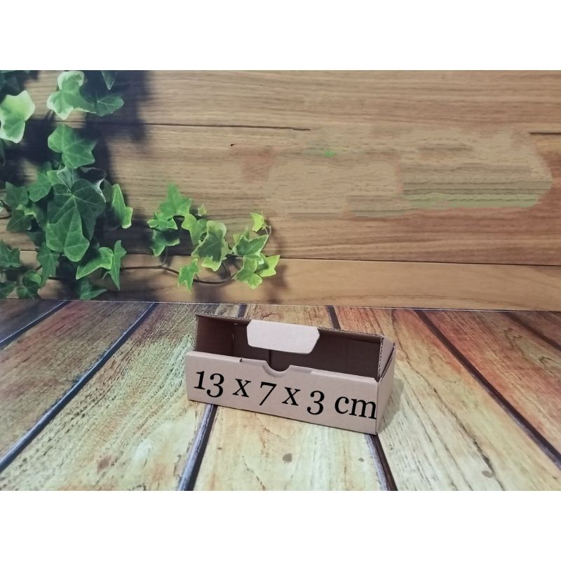 

kardus 13 x 7 x 3cm .. Die Cut