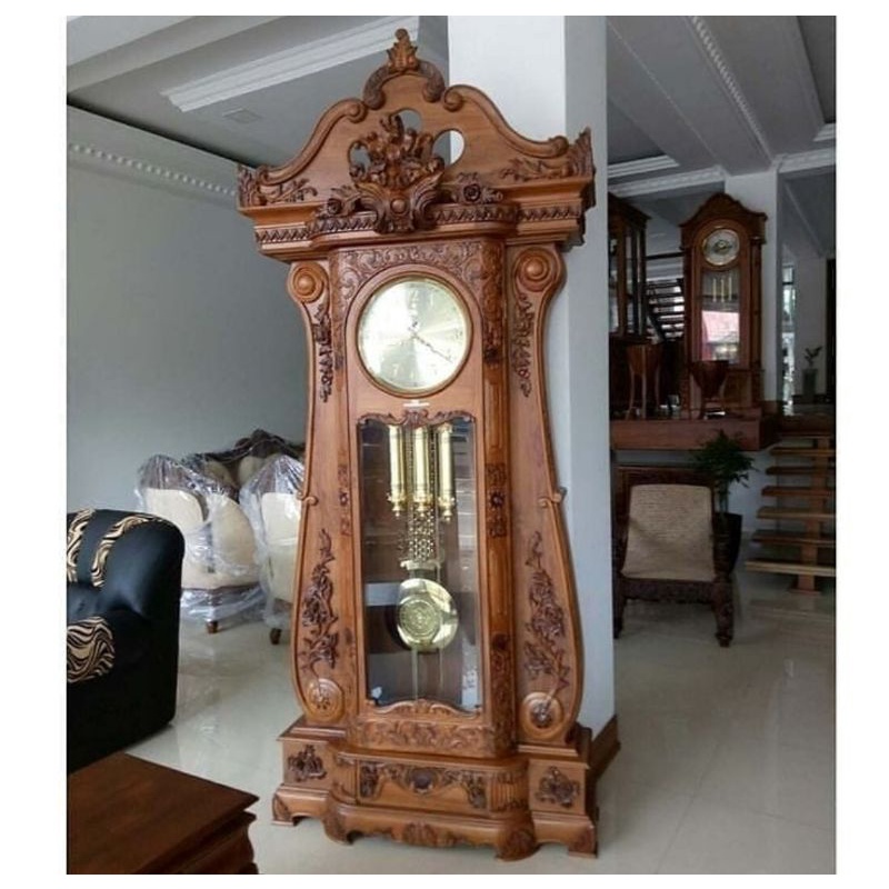 lemari jam hias bagong kayu jati