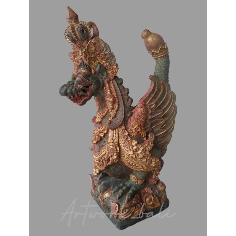patung kayu naga banda