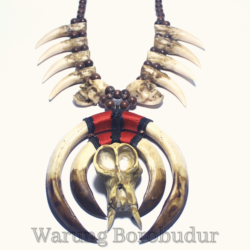 Kalung Taring Babi Hutan Double Serangkai Tengkorak Kepala Monyet Khas Dayak Kalimantan