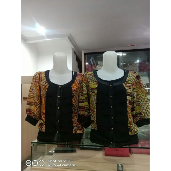 Atasan lengan 3/4 + dalaman singlet merk E'JUST