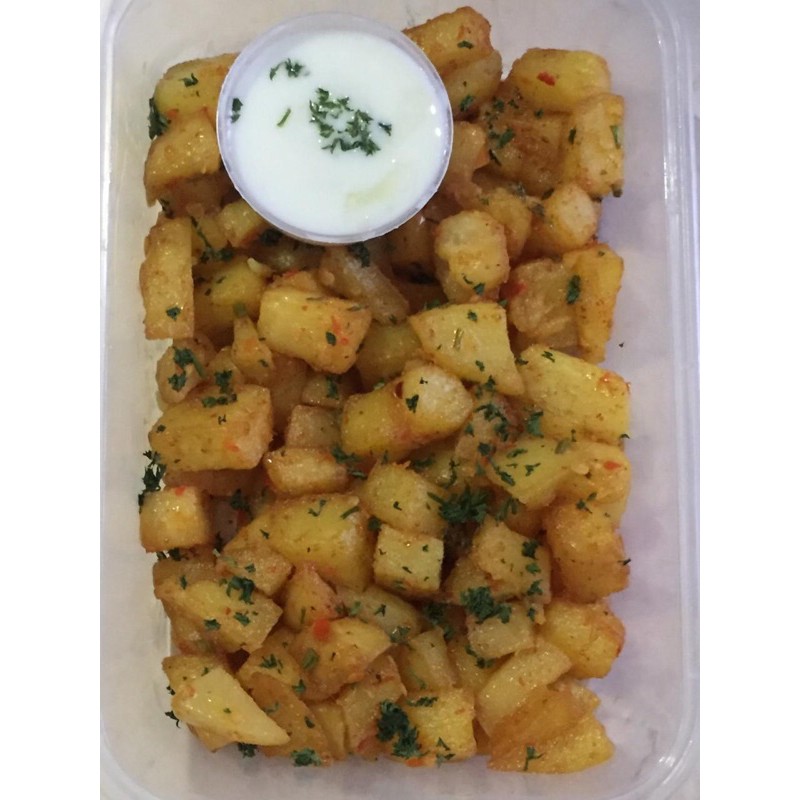 

Batata harra with lebanese yoghurt authentic lebanese middle eastern Food