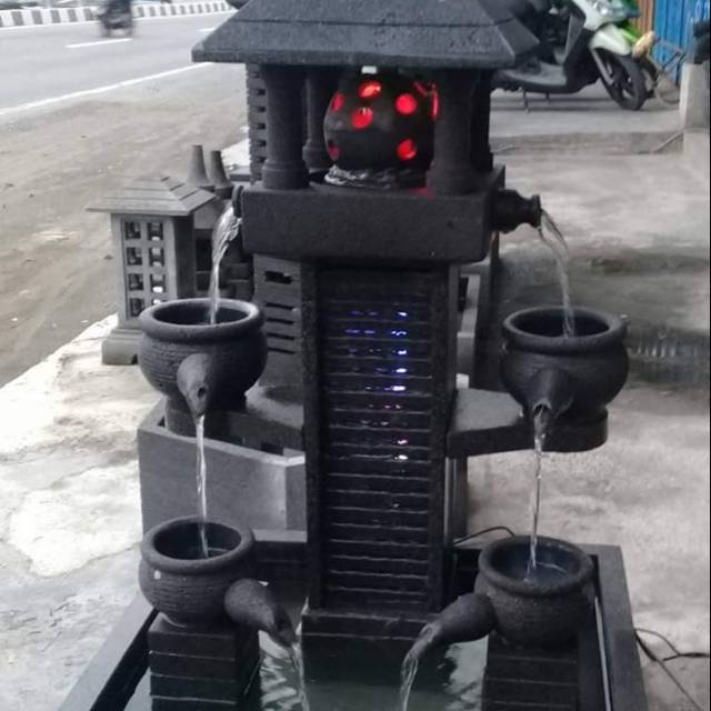 Air Mancur Bola Putar Batu Alam