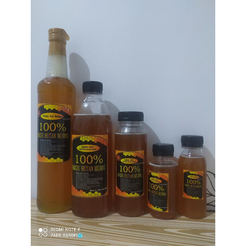 

Madu hutan asli dan murni/ Madu sialang Di panen oleh tim Asrof Madu ukuran 500 ml