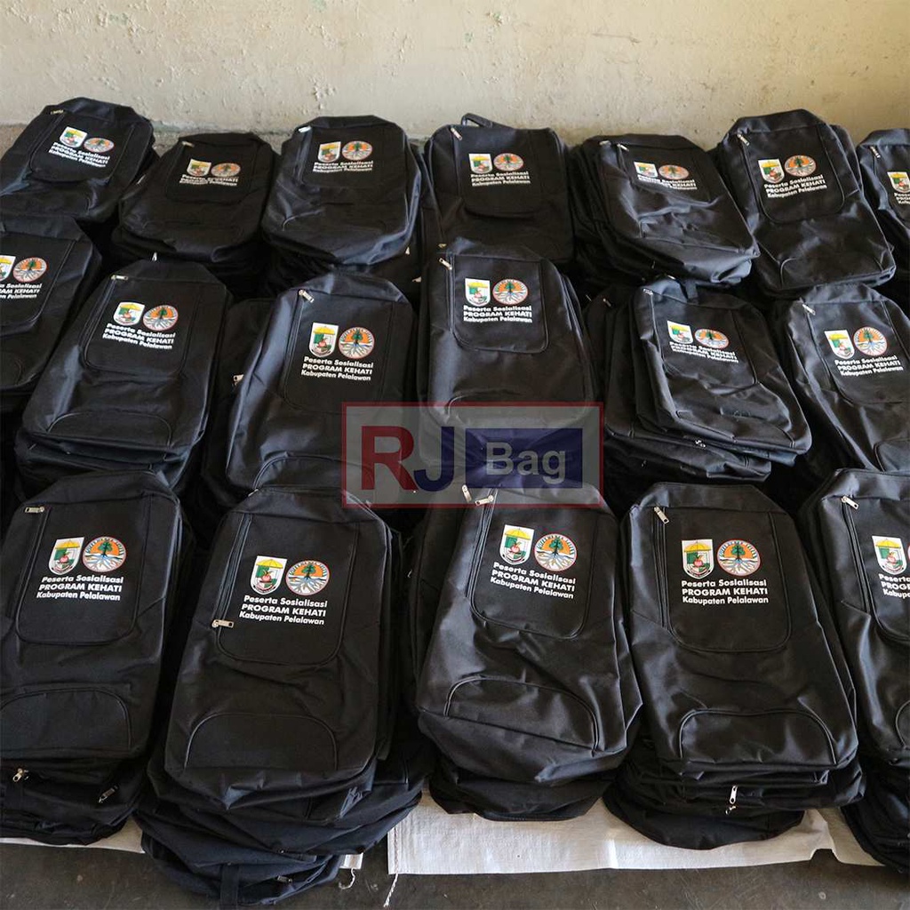 TAS GROSIR SEMINAR PROGRAM KEHATI KABUPATEN PELALAWAN SEMINAR SOUVENIR TAS HITAM CUSTOM RANSEL GROSIR SABLON