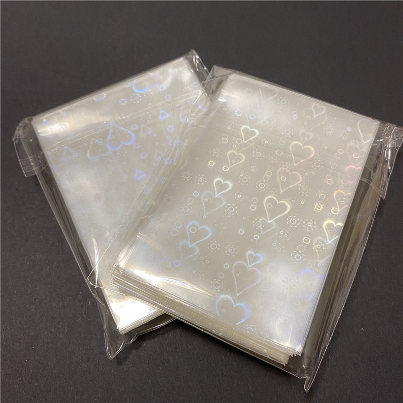 50pcs Sarung Kartu Laser Holografik Bentuk Hati