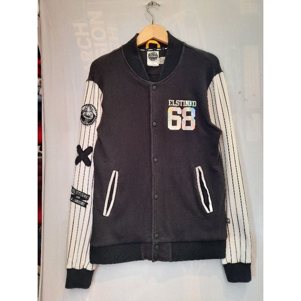 Thrift Varsity Hitam Elstinko 110/72 L