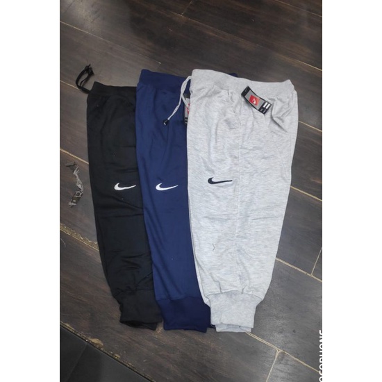 Celana joger/pendek/olahraga/santai/selutut pria/wanita