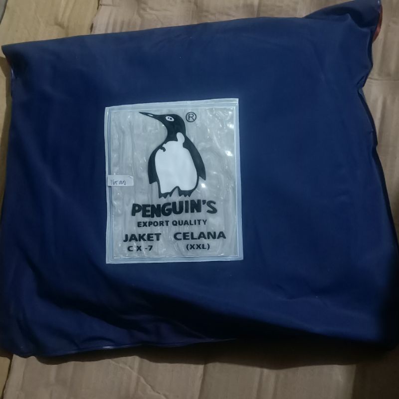 Penguins CX7 jas hujan super tebal murah