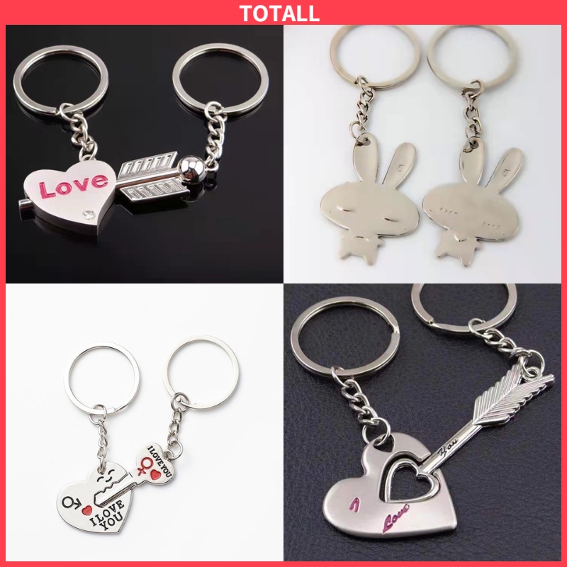 Aksesoris: Set 2Pcs Gantungan Kunci Pasangan Bentuk Hati+Kunci Tulisan 'I Love You' , Warna Silver produk baru mode