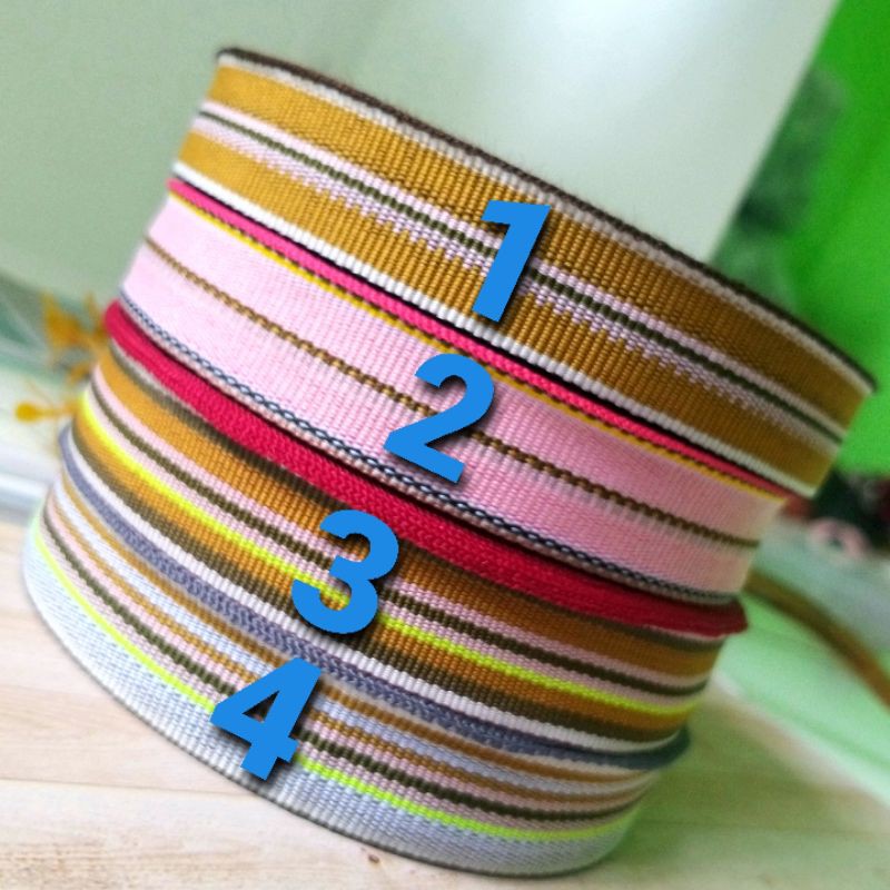 

per meter,pita salur motif pelangi/lidi lebar 2cm.