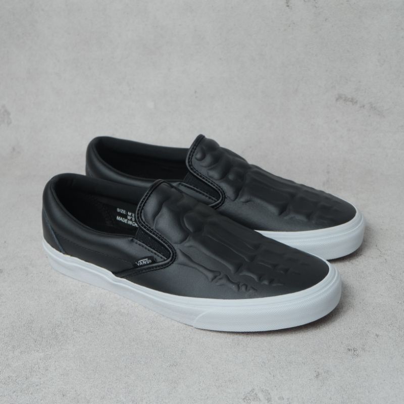 VANS SLIP ON LEATHER X-RAY BONES
