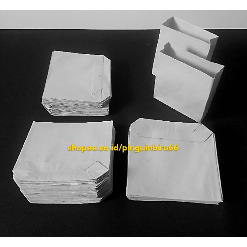 

Paper bag paper baking abu abu / Kemasan serbaguna bungkus aneka gorengan & snack . 16 x 10 x 5 cm.