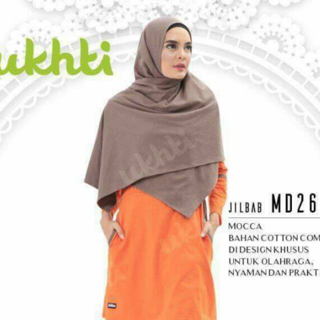 Jilbab olahraga munira yang di desaign khusus untuk kenyamanan berolahraga. warna capucino  ungu tua