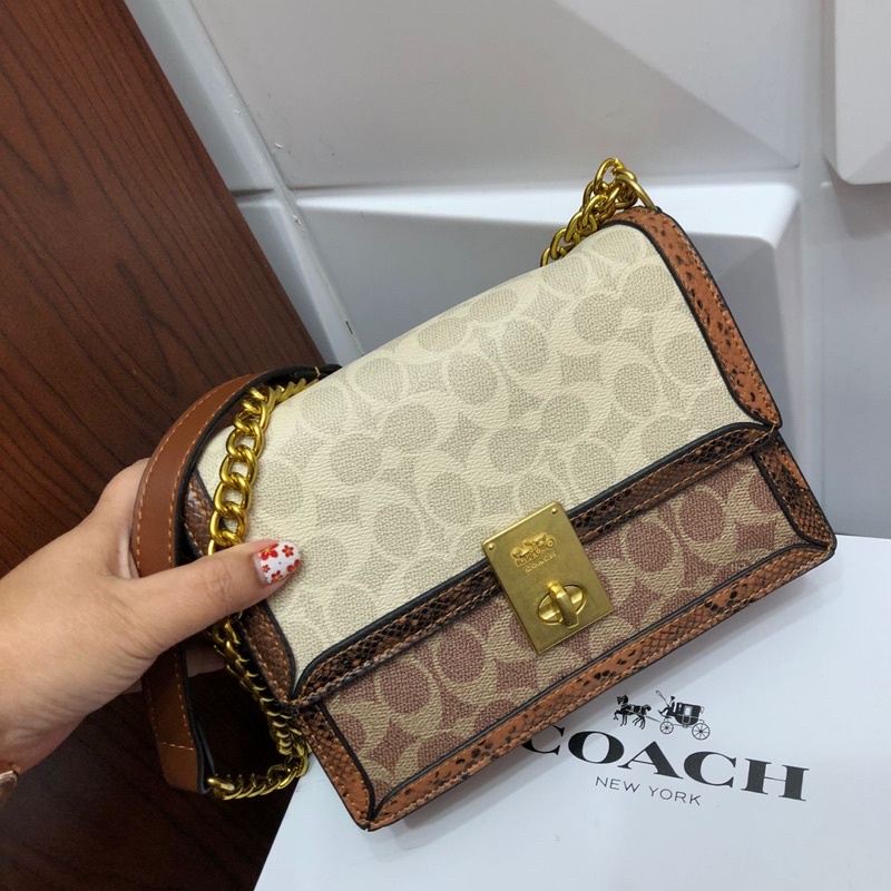 Coach Hutton/Taswanita