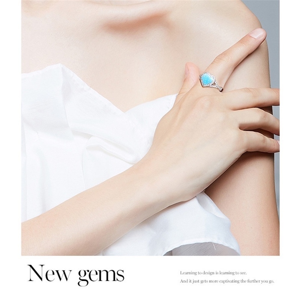 New blue heart-shaped opal inlaid zircon ring