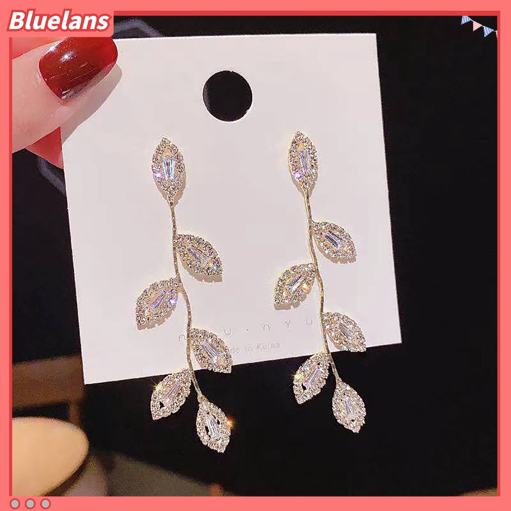 1 Pasang Anting Stud Cubic Zirconia Bentuk Daun Bahan Alloy Untuk Wanita