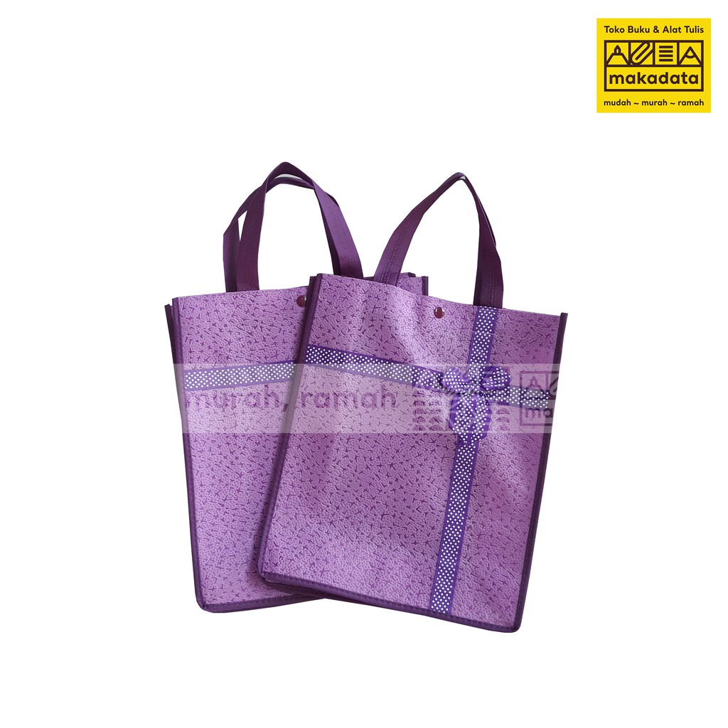 

GOODIE BAG | TAS SPUNBOND MOTIF UNGU POLKADOT NC-420 28 X 32 MURAH