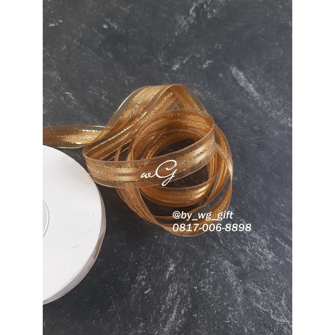 

Premium Product!!! Pita Organdi - Coklat; Lebar 1.8Cm; Panjang 25 Yard - Paling Dicari