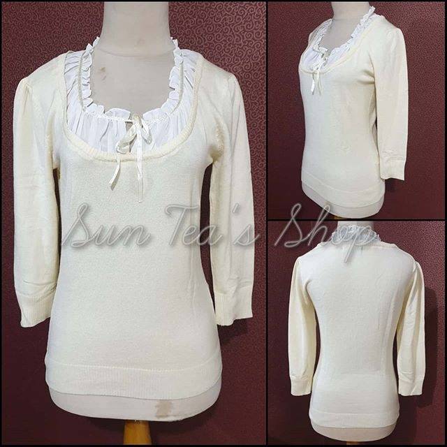 Soft yellow victorian pleated sweater blouse.