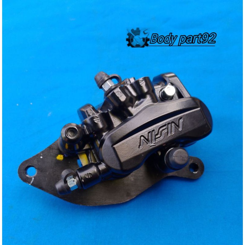 KALIPER PALABABY DEPAN NEW PCX 150 / ADV 3 PISTON ORIGINAL NISIN